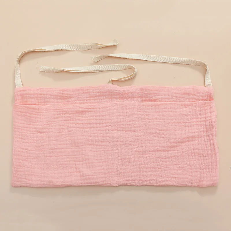 Organisateur de lit bébé multi-poches pour couches et accessoires