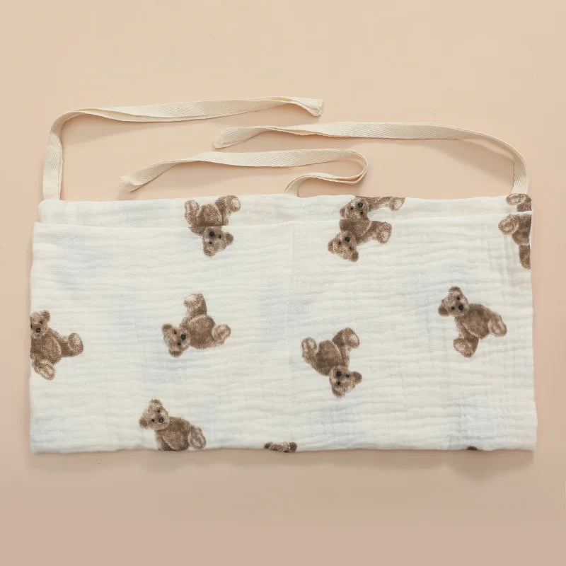 Organisateur de lit bébé multi-poches pour couches et accessoires