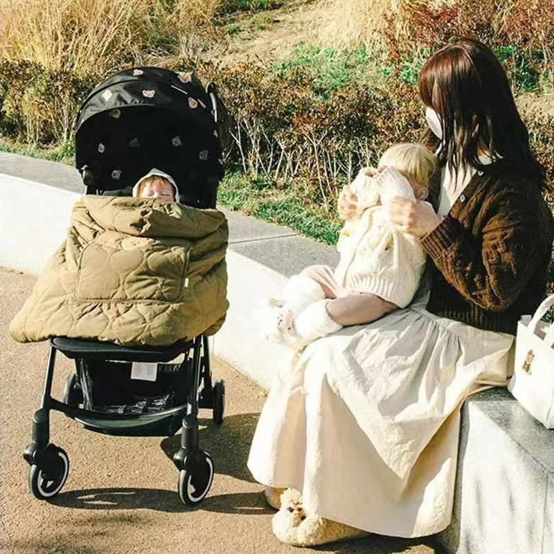 Cape à capuche bébé pour poussette et porte-bébé