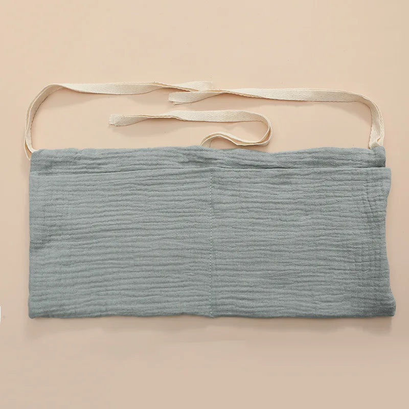 Organisateur de lit bébé multi-poches pour couches et accessoires