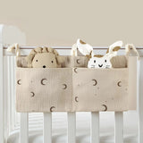 Organisateur de lit bébé multi-poches pour couches et accessoires