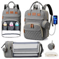 Sac à dos à langer 3-en-1 Bouni — Table à langer + Lit de voyage + Port USB