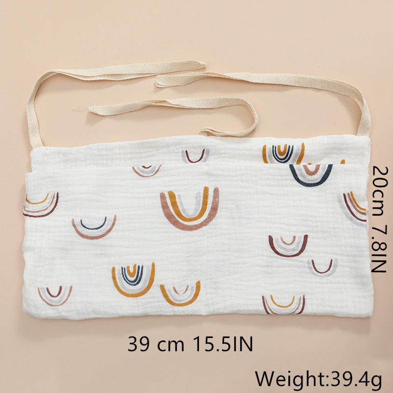 Organisateur de lit bébé multi-poches pour couches et accessoires