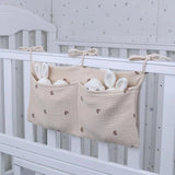 Organiseur tête de lit bébé Bouni — Sac rangement couches multifonction