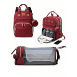Sac à langer rouge avec lit pliant intégré