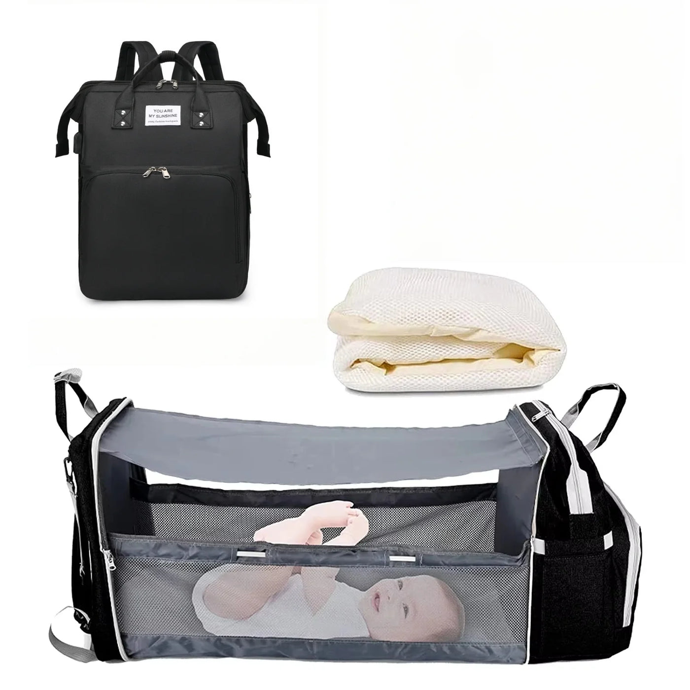 Sac à langer noir avec lit d’appoint bébé